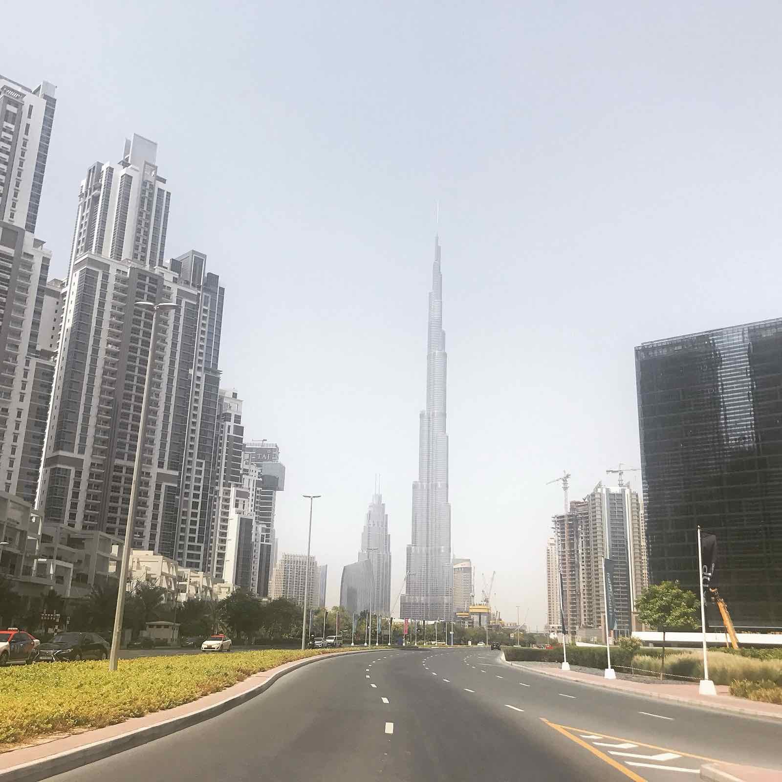 Burj Khalifa seen from a Business Bay boulevard (location photo)